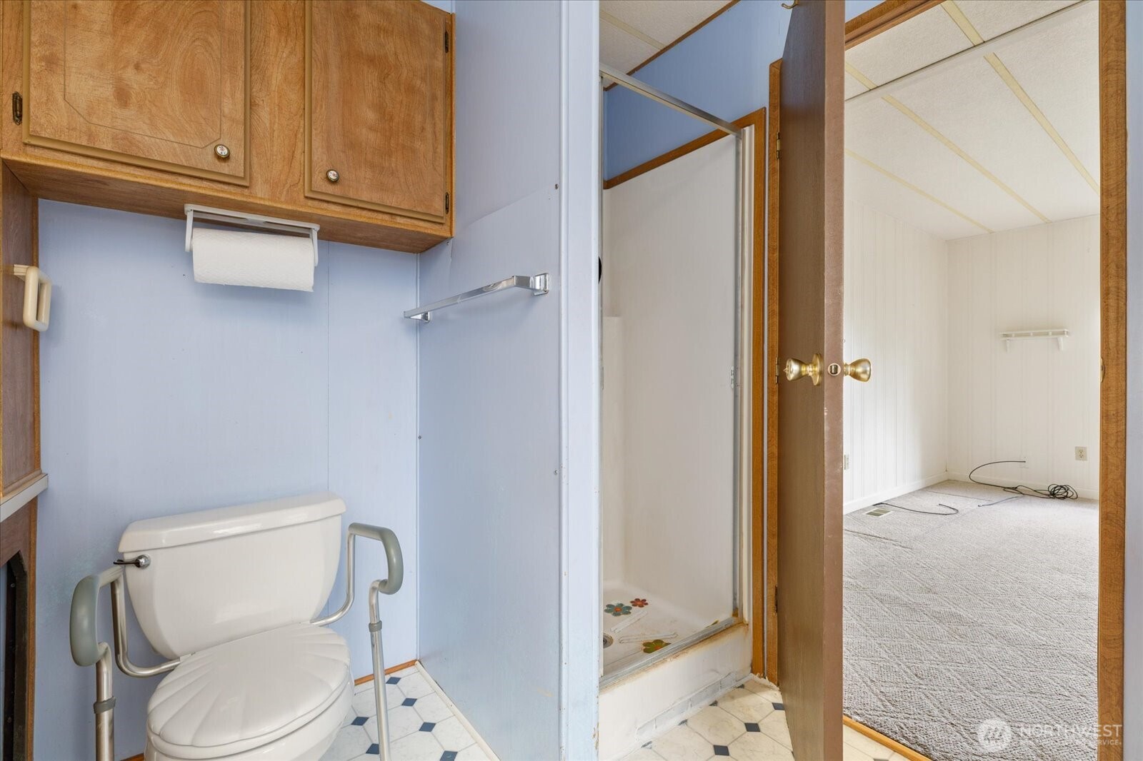 1677 Penn Cove Road Oak Harbor, WA 98277 - Photo 21 of 40 a bathroom with a toilet and a shower