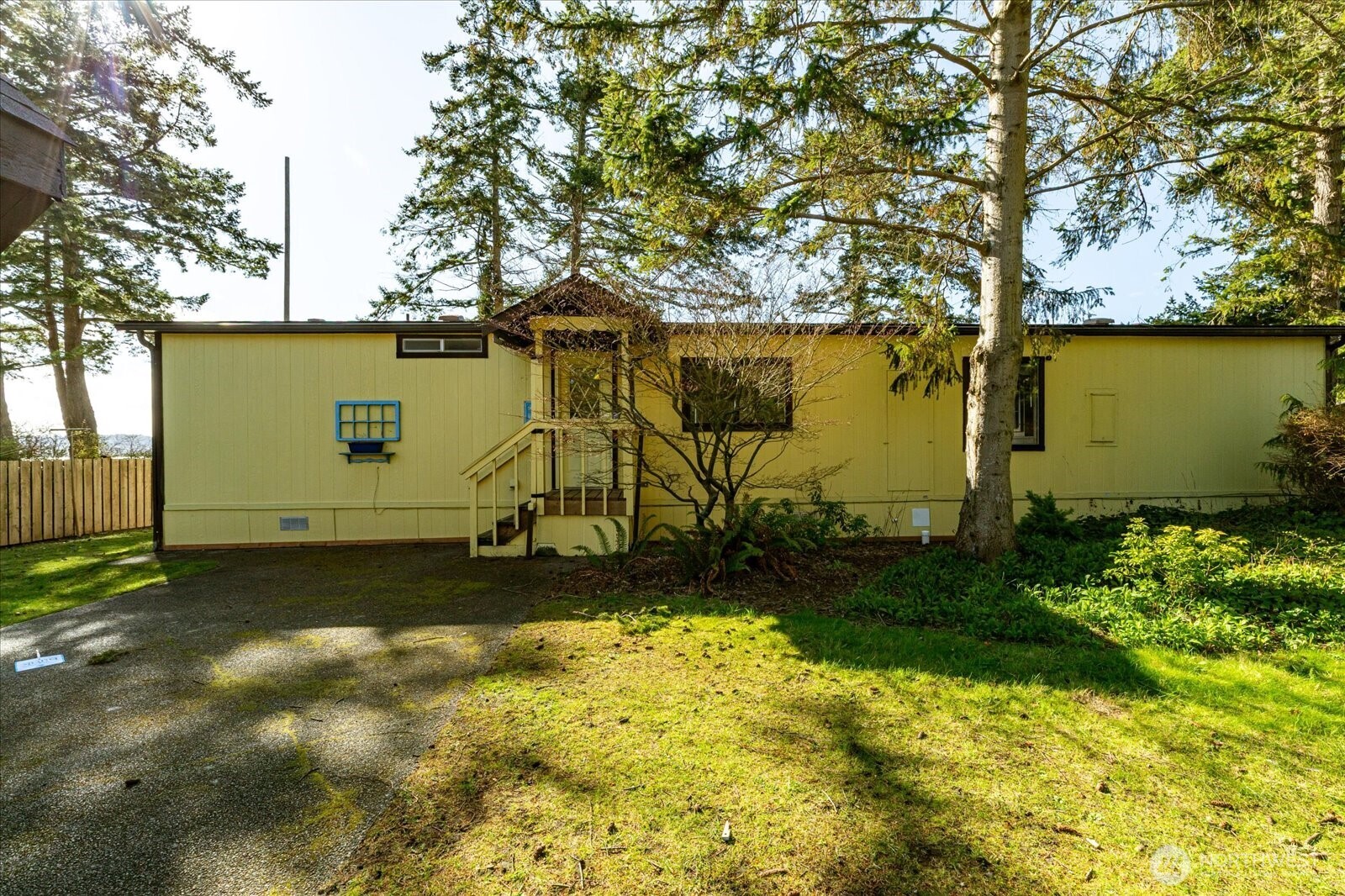 1677 Penn Cove Road Oak Harbor, WA 98277 - Photo 32 of 40 a view of a backyard