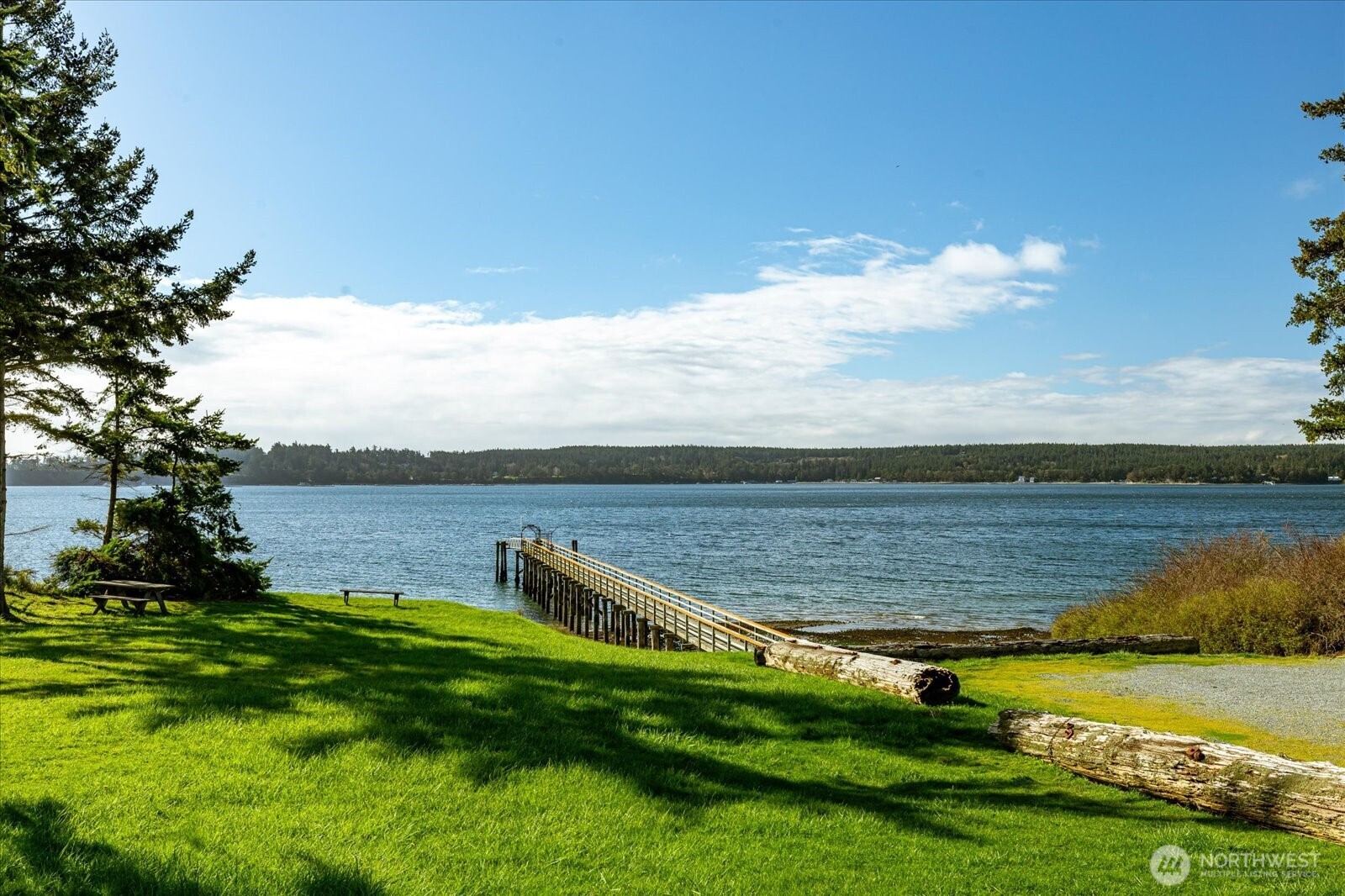 1677 Penn Cove Road Oak Harbor, WA 98277 - Photo 37 of 40 a view of a lake with a big yard