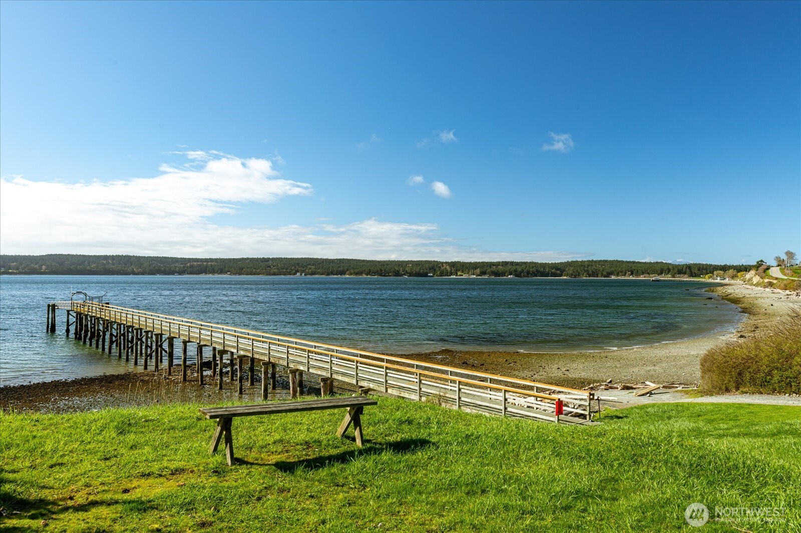 1677 Penn Cove Road Oak Harbor, WA 98277 - Photo 38 of 40 a view of a swimming pool with a lake view