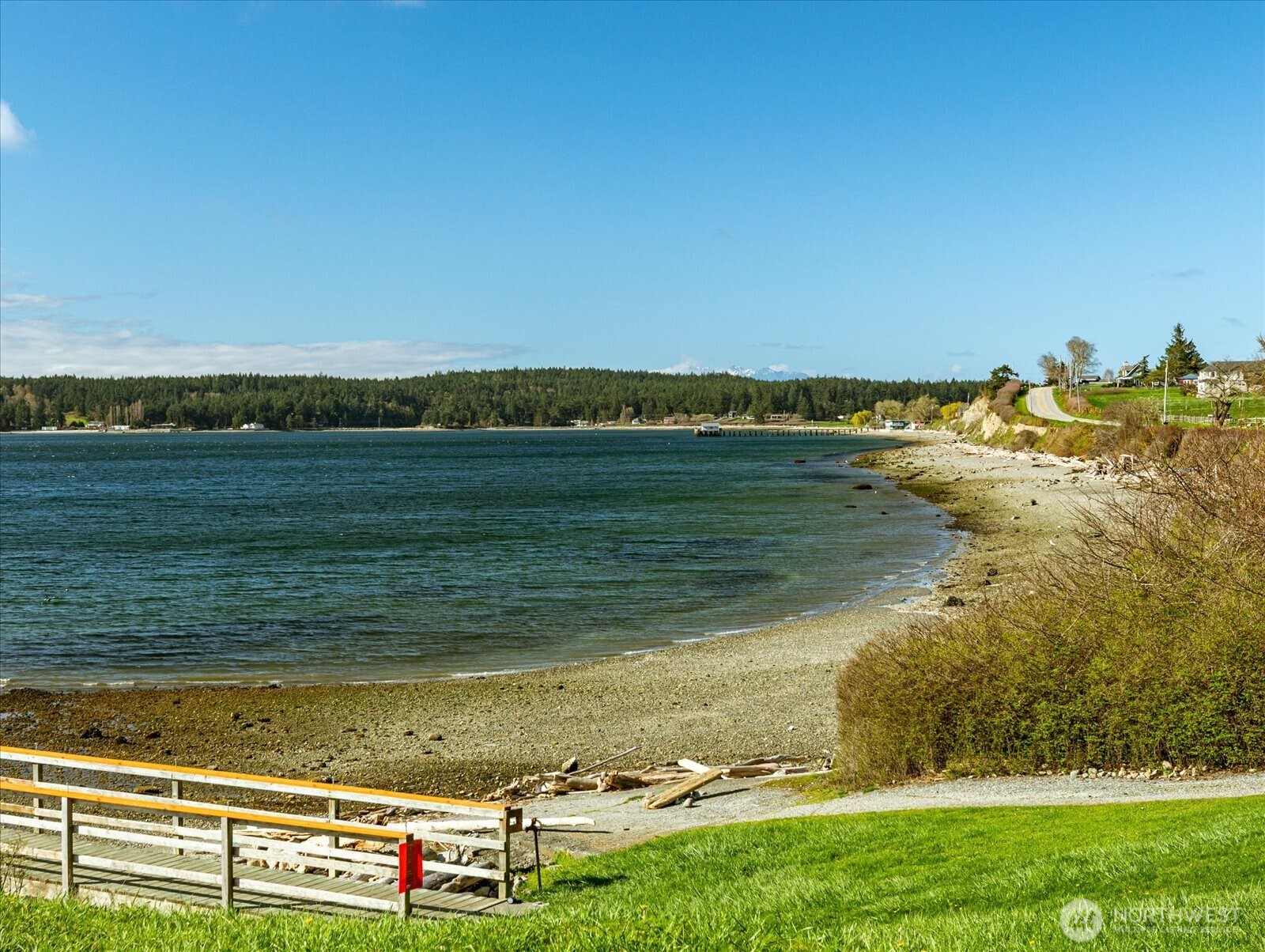 1677 Penn Cove Road Oak Harbor, WA 98277 - Photo 39 of 40 a view of an ocean and beach