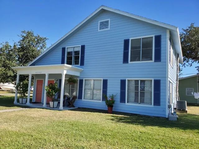 a view of house with outdoor space