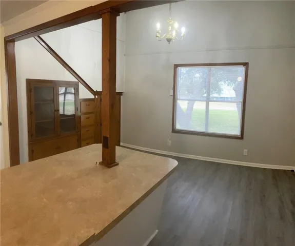 a view of an empty room and window