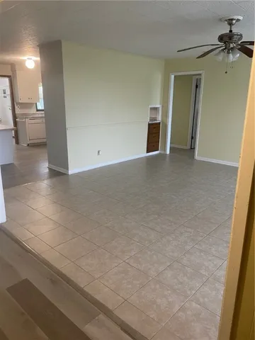 a view of a livingroom with a staircase