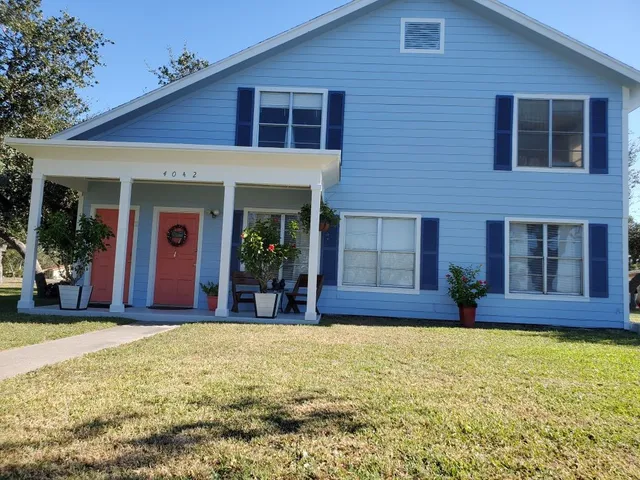 a view of house with outdoor space