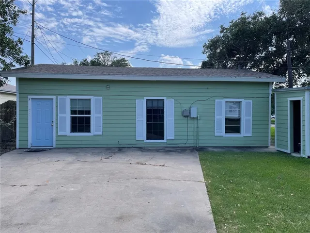 front view of a house with yard