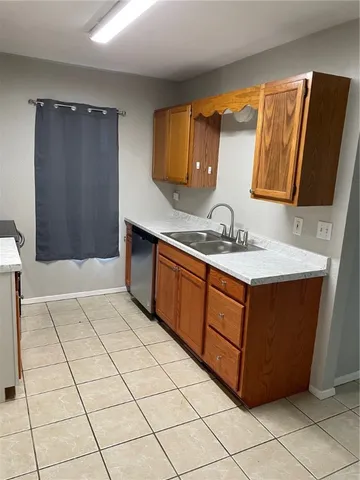 a bathroom with a sink mirror and vanity