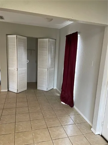 an empty room with a door