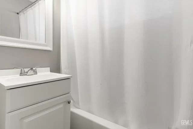 a bathroom with a sink and a vanity