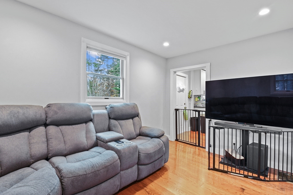 38 Twichell Street Athol, MA 01331 - Photo 13 of 26 a living room with furniture and a flat screen tv