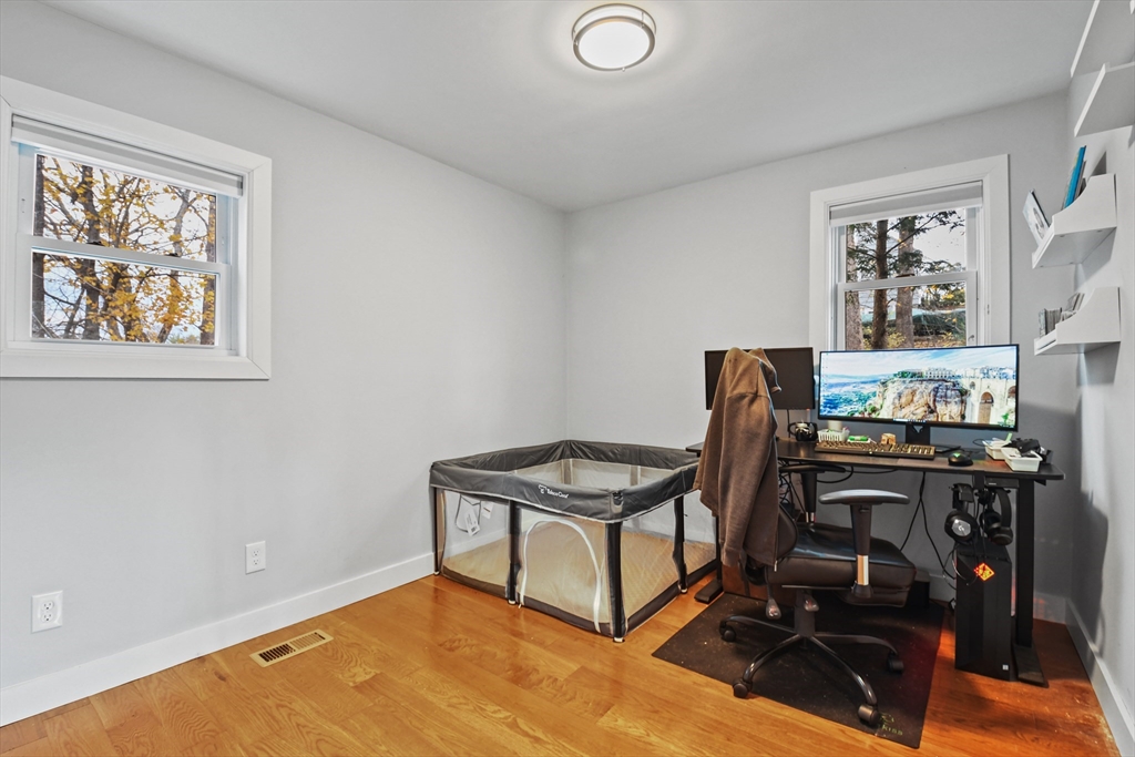 38 Twichell Street Athol, MA 01331 - Photo 15 of 26 a view of a workspace with furniture and a window