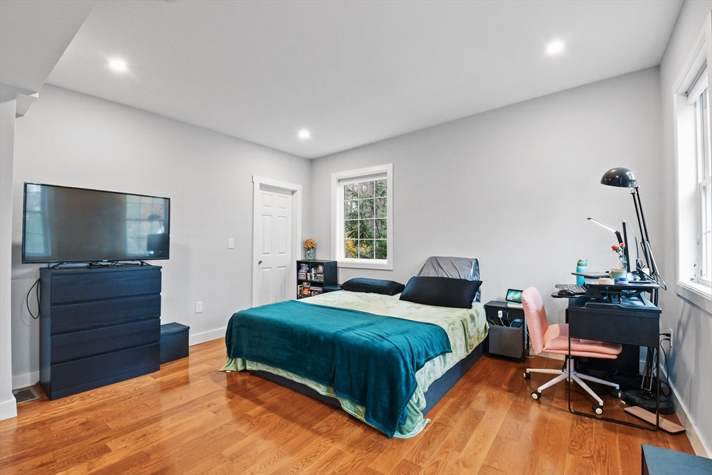 38 Twichell Street Athol, MA 01331 - Photo 17 of 26 a bedroom with a bed and a flat screen tv