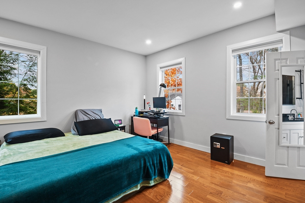 38 Twichell Street Athol, MA 01331 - Photo 18 of 26 a bedroom with a bed and wooden floor