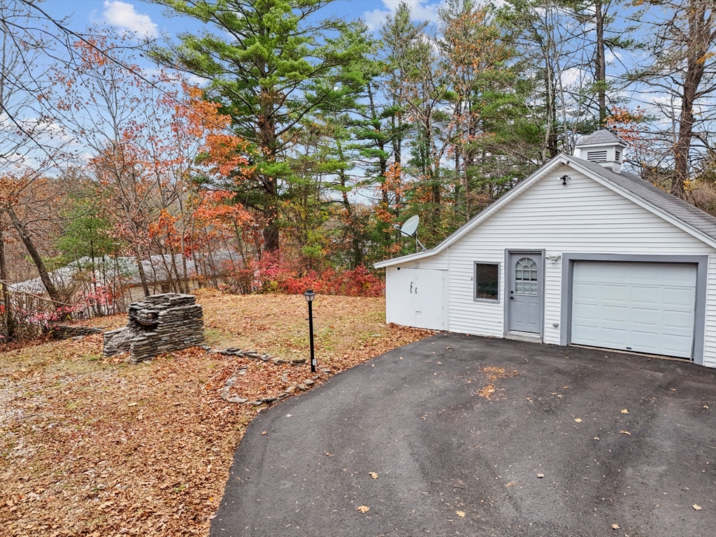 38 Twichell Street Athol, MA 01331 - Photo 22 of 26 a view of a house with a yard covered in snow