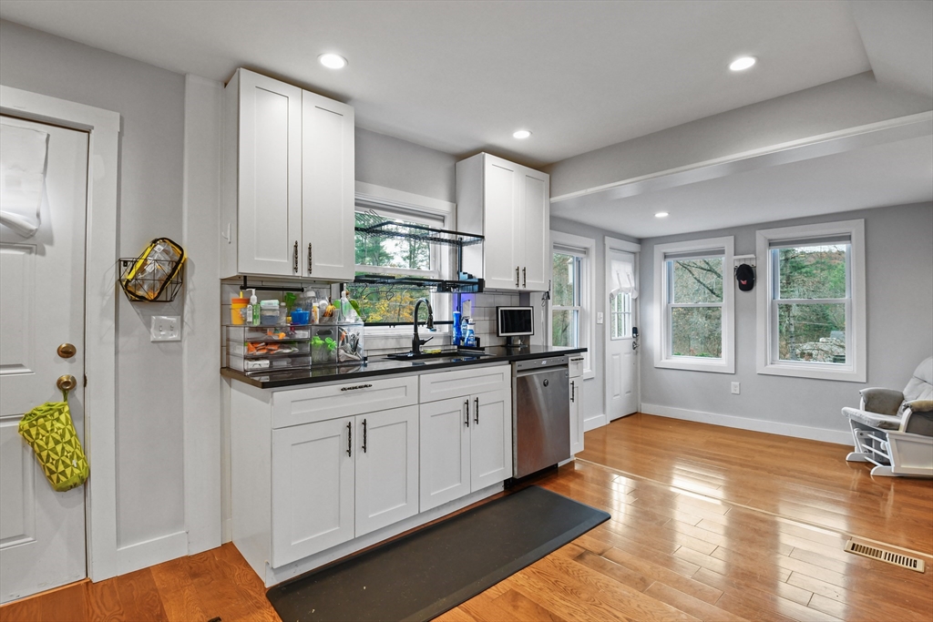 38 Twichell Street Athol, MA 01331 - Photo 8 of 26 a kitchen with stainless steel appliances granite countertop a sink refrigerator and window