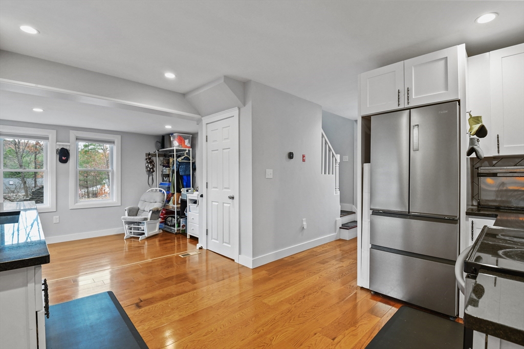 38 Twichell Street Athol, MA 01331 - Photo 9 of 26 a kitchen with stainless steel appliances a refrigerator and wooden floor