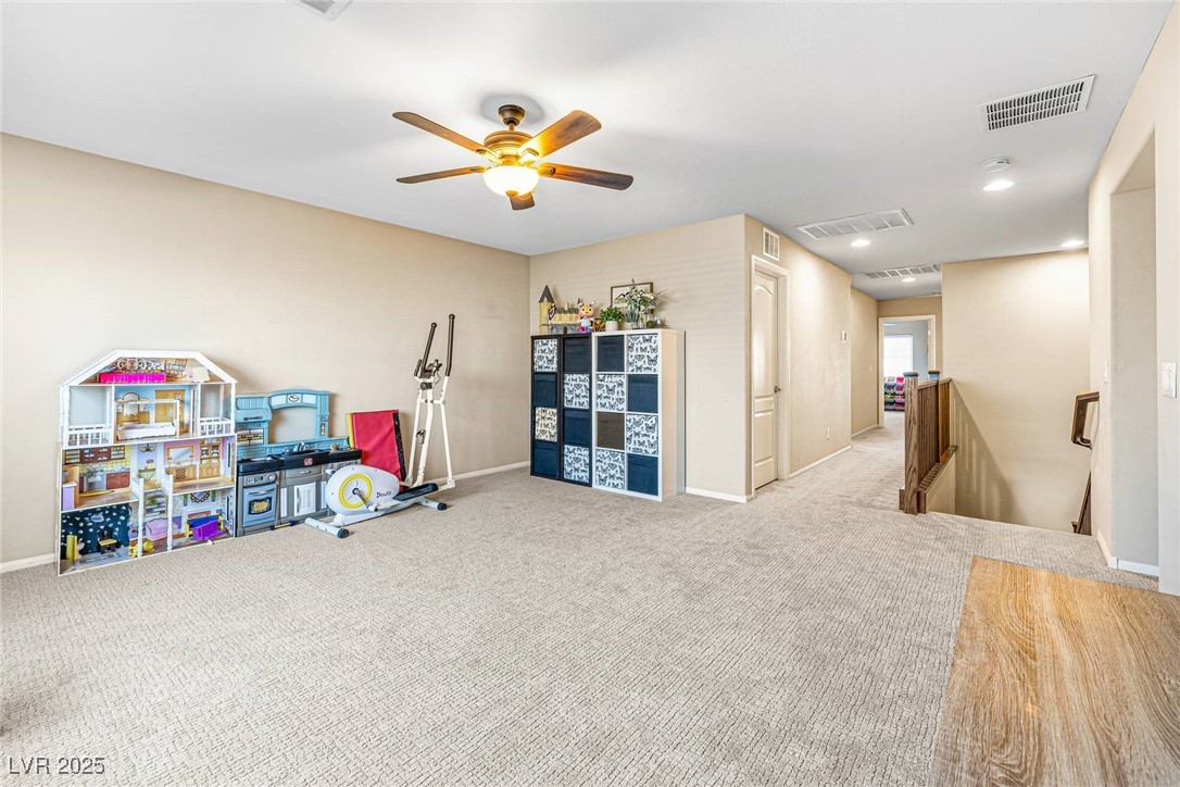 10523 Laurel Mountain Lane Las Vegas, NV 89166 - Photo 12 of 36 Loft/Playroom with carpet flooring, a ceiling fan, and recessed lighting