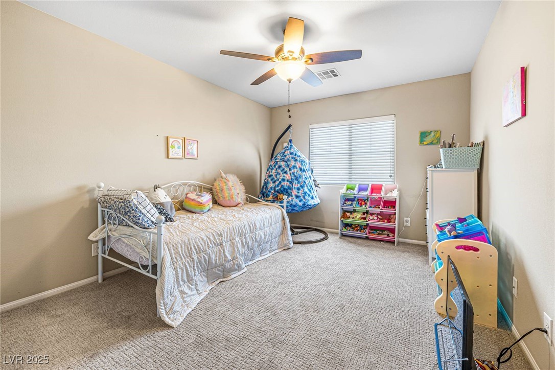 10523 Laurel Mountain Lane Las Vegas, NV 89166 - Photo 17 of 36 3rd Bedroom with carpet and a ceiling fan