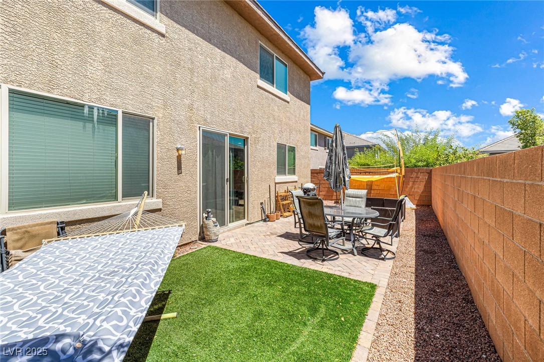 10523 Laurel Mountain Lane Las Vegas, NV 89166 - Photo 22 of 36 Fenced back yard with faux grass