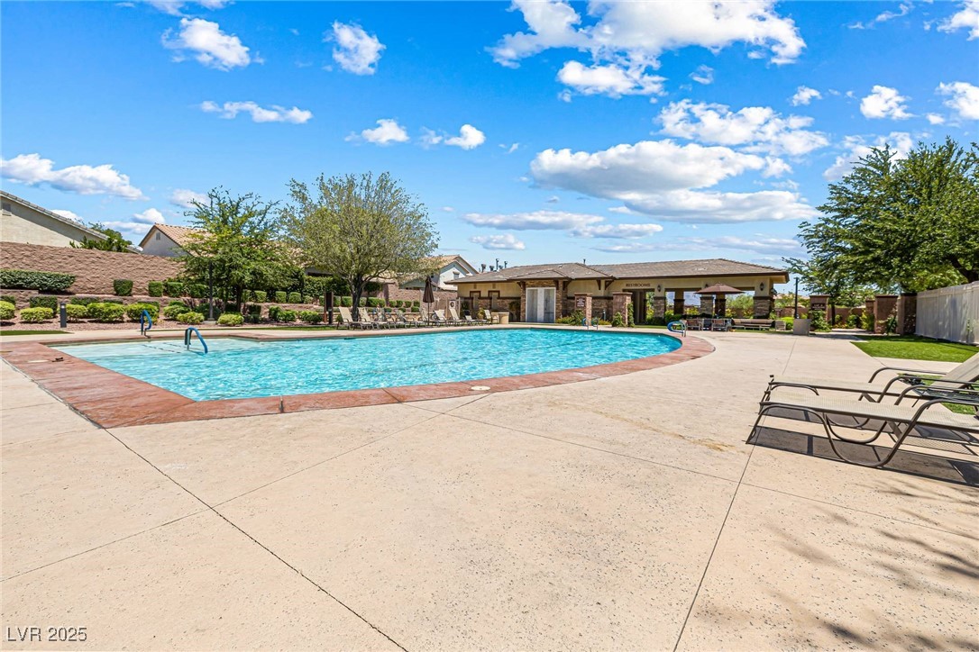 10523 Laurel Mountain Lane Las Vegas, NV 89166 - Photo 25 of 36 Community pool with a patio area