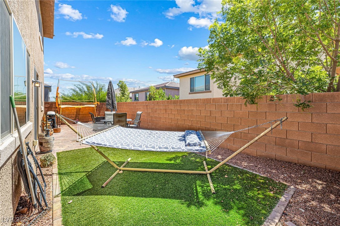 10523 Laurel Mountain Lane Las Vegas, NV 89166 - Photo 29 of 36 Fenced yard featuring a patio