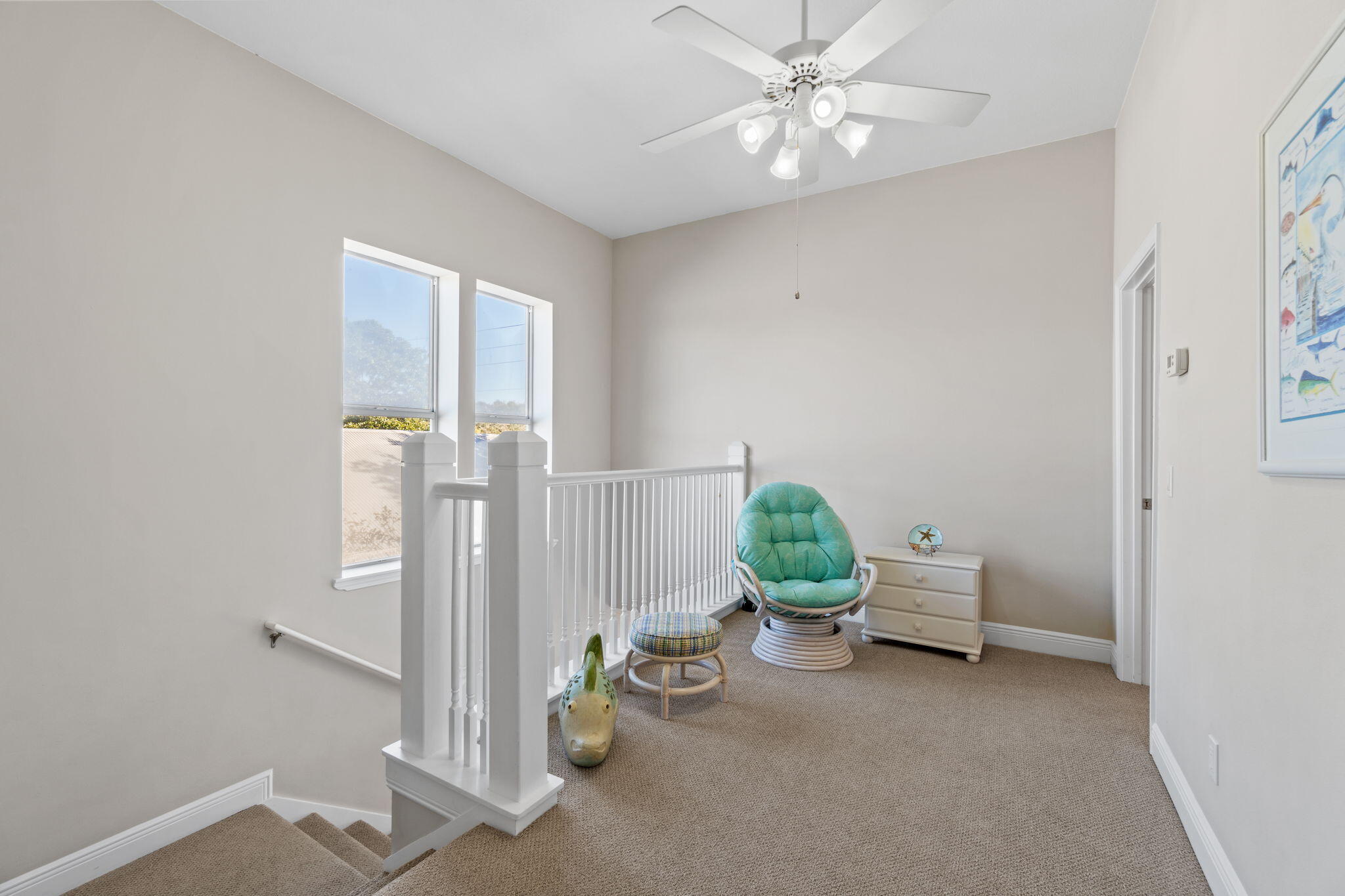 80 Dolphin Street Destin, FL 32541 - Photo 16 of 34 a room with furniture and a window