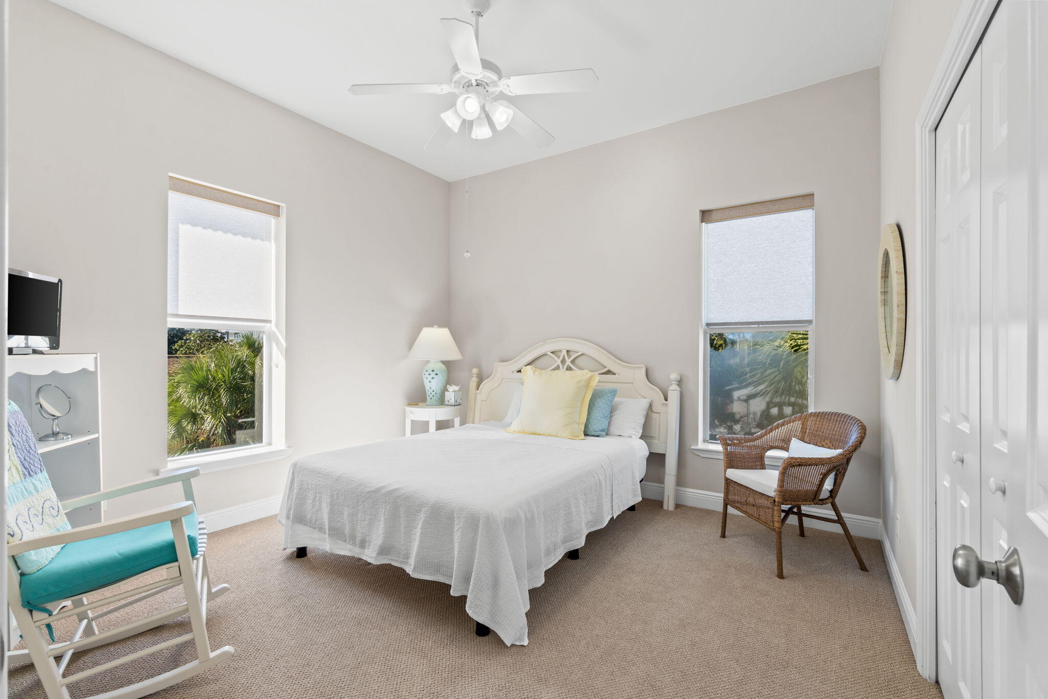 80 Dolphin Street Destin, FL 32541 - Photo 17 of 34 a bedroom with a bed chair and a window