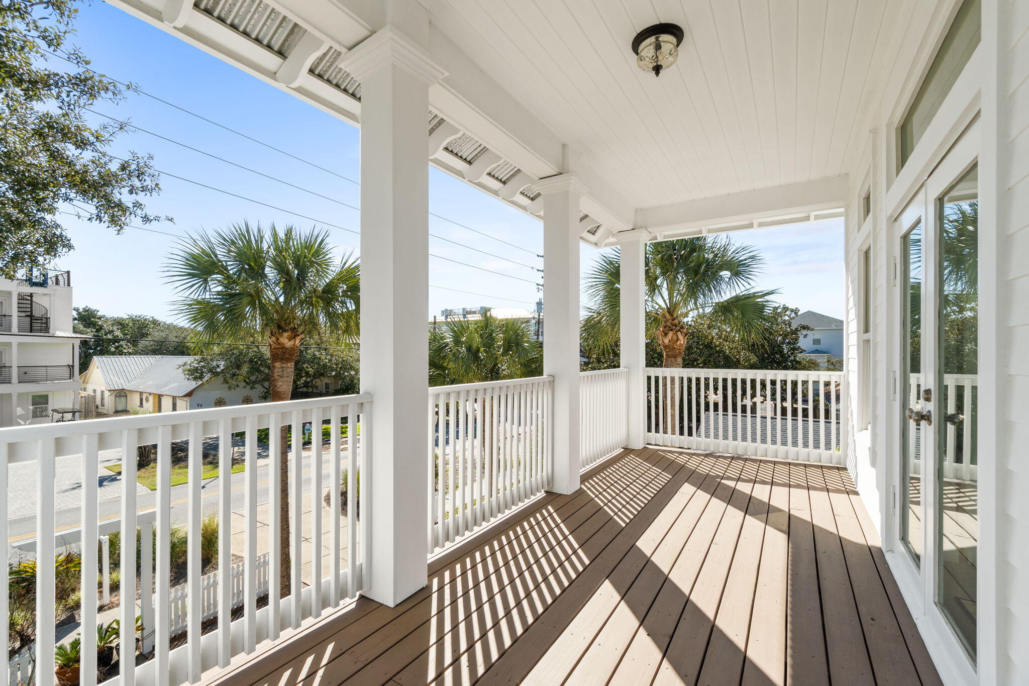 80 Dolphin Street Destin, FL 32541 - Photo 25 of 34 a view of a balcony with wooden floor
