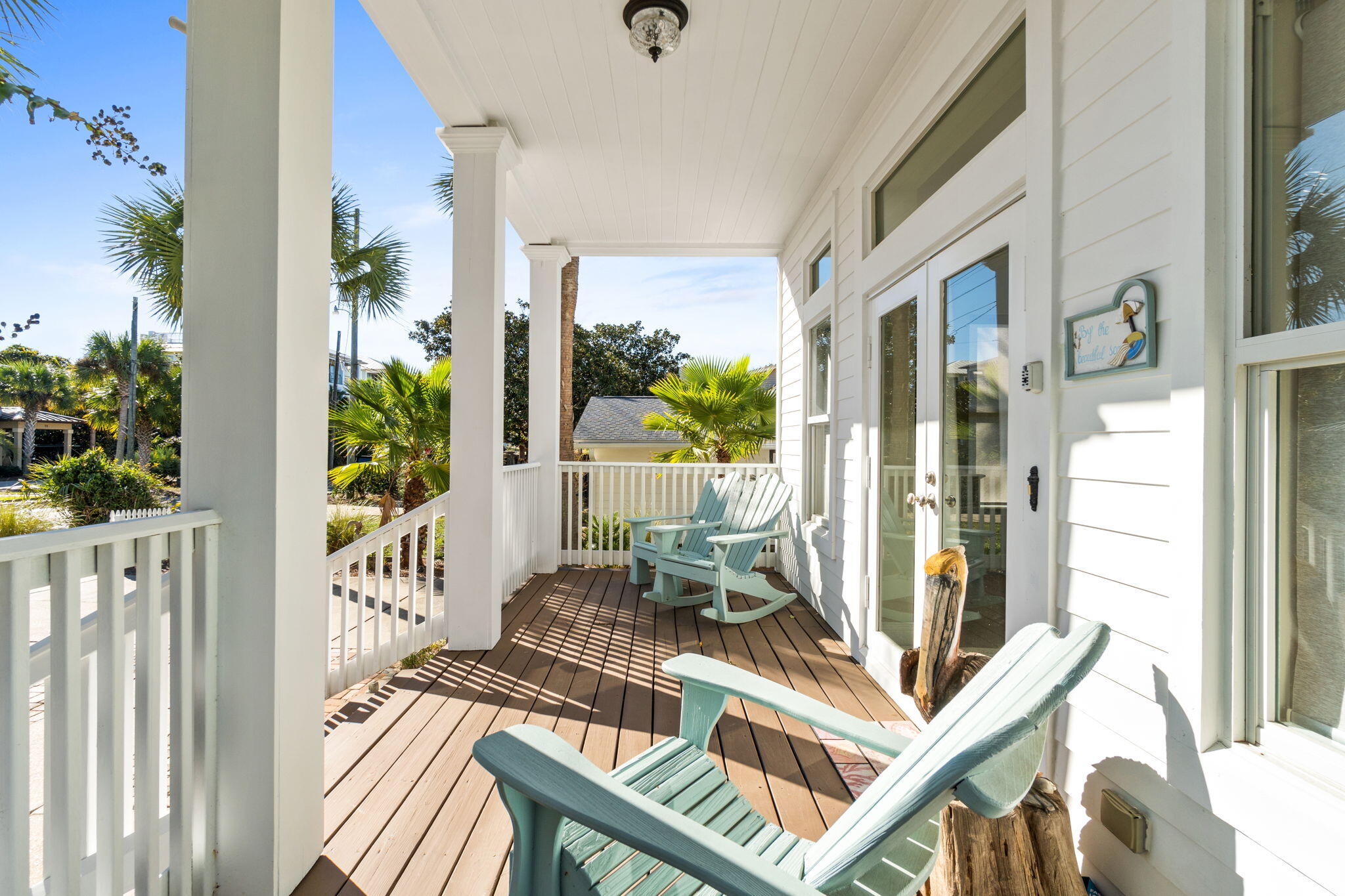 80 Dolphin Street Destin, FL 32541 - Photo 30 of 34 a view of a balcony with wooden floor