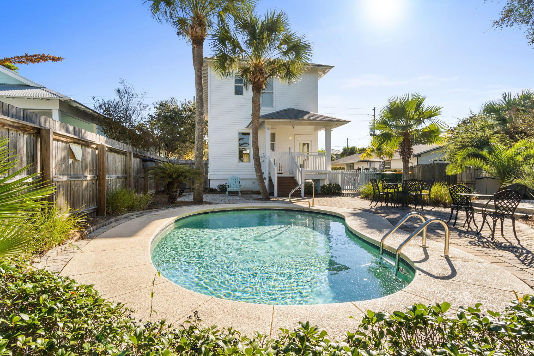 80 Dolphin Street Destin, FL 32541 - Photo 33 of 34 a view of a swimming pool with a patio