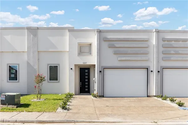 a bedroom with a bed and a fireplace