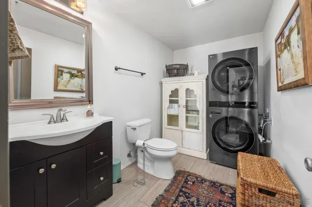 a view of a patio with table and chairs potted plants