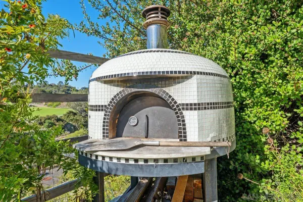 a outdoor living space with patio furniture and a potted plant