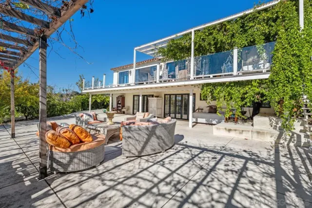 a bedroom with furniture and window