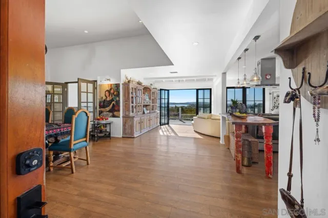 a view of living room filled with furniture and window