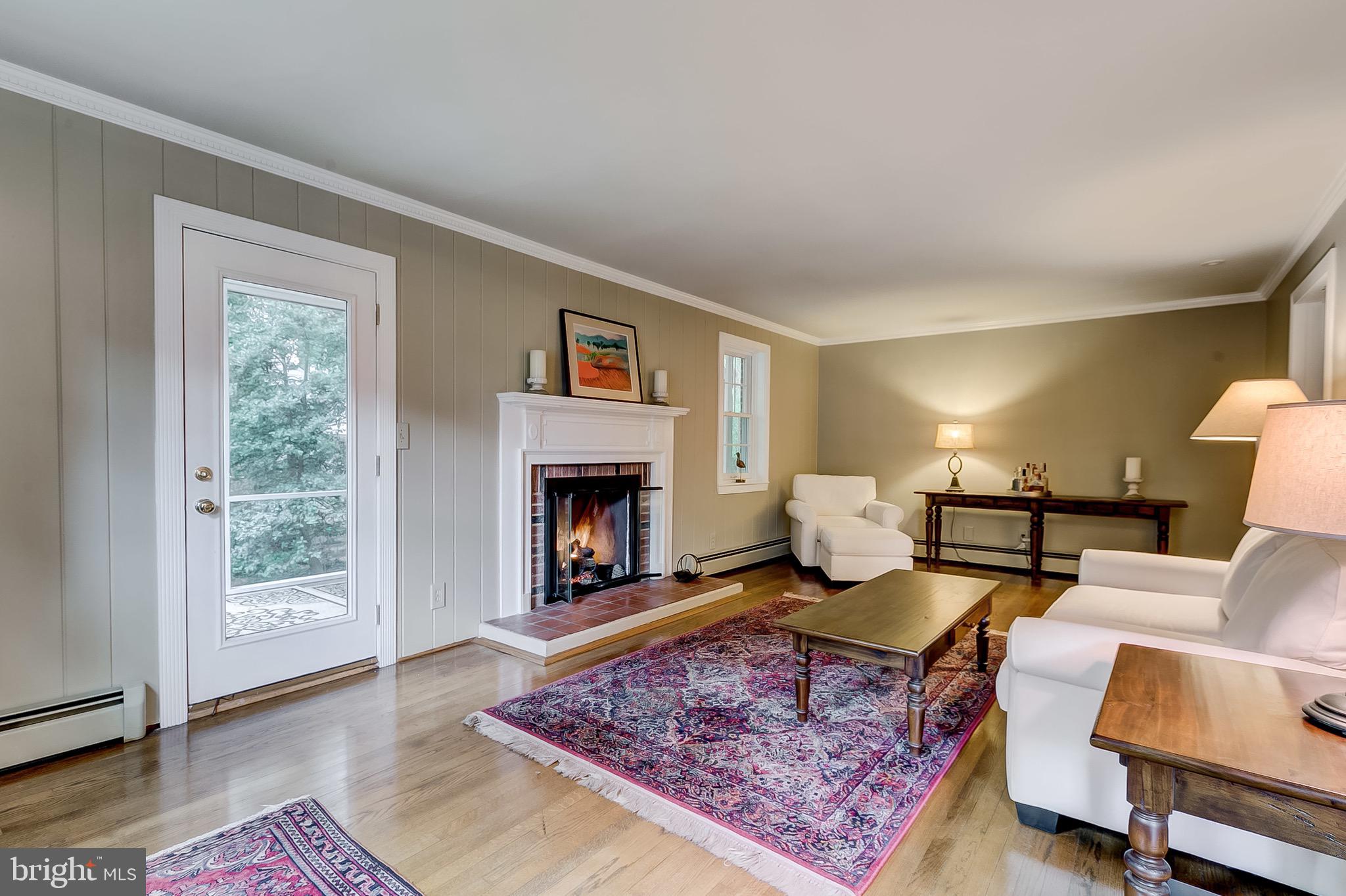 402 Range Road Baltimore, MD 21204 - Photo 5 of 43 Spacious living room with gleaming hardwoods
