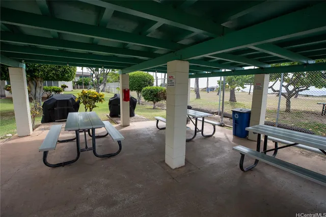 a front view of building with yard