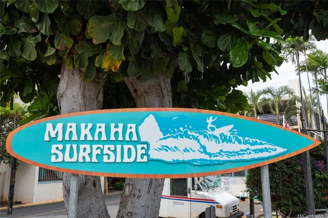 a wooden bench sitting in front of a house