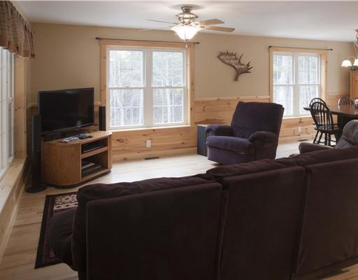 8 Beaver Brook Road Dover-Foxcroft, ME 04426 - Photo 5 of 25 Living Room. Ample daylight fills...