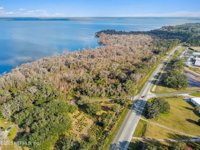 a view of ocean view with large trees