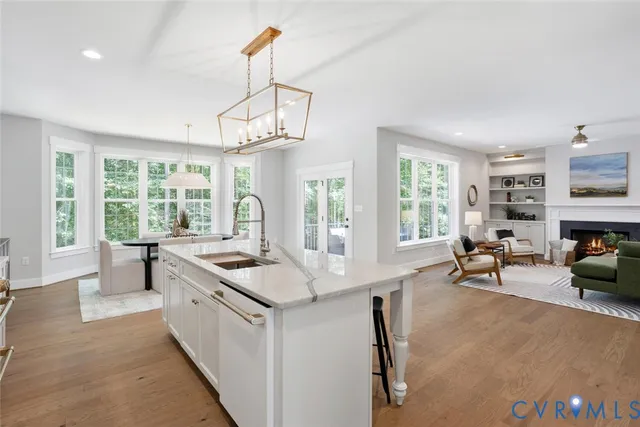a living room with furniture and a table