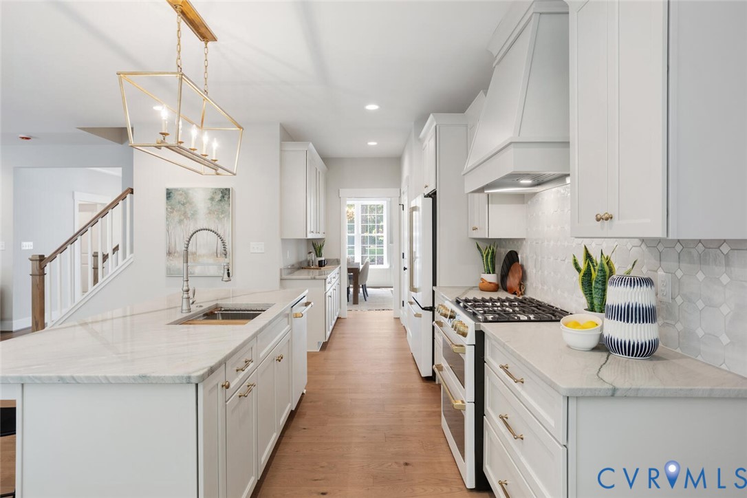 13800 Summerlook Lane Chesterfield, VA 23832 - Photo 18 of 49 a kitchen with counter top space cabinets and appliances