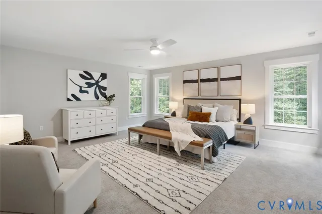 a bedroom with furniture and window