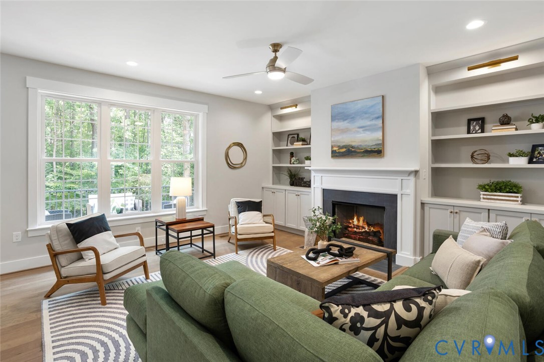 13800 Summerlook Lane Chesterfield, VA 23832 - Photo 3 of 49 a living room with furniture and a fireplace