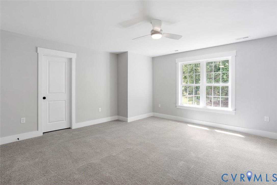 13800 Summerlook Lane Chesterfield, VA 23832 - Photo 36 of 49 an empty room with windows and fan