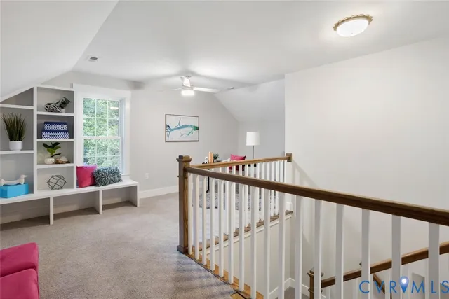 a view of a livingroom with furniture and toys
