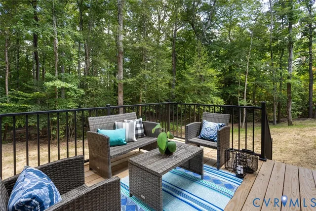 a view of roof deck with furniture