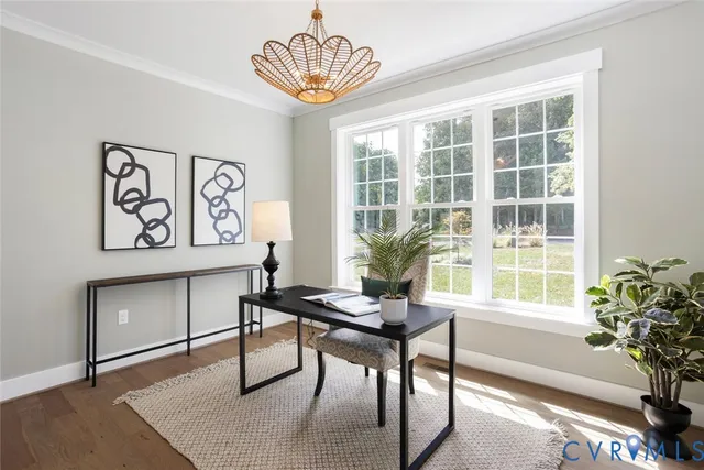 a workspace with furniture and a window