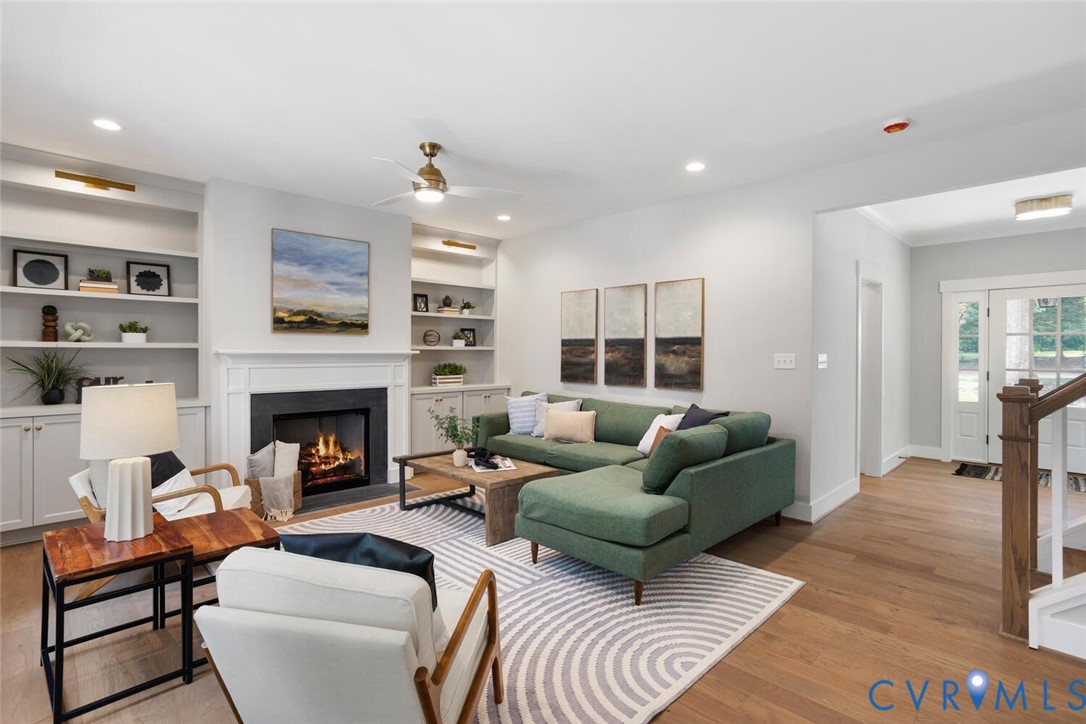 13800 Summerlook Lane Chesterfield, VA 23832 - Photo 10 of 49 a living room with furniture and a fireplace
