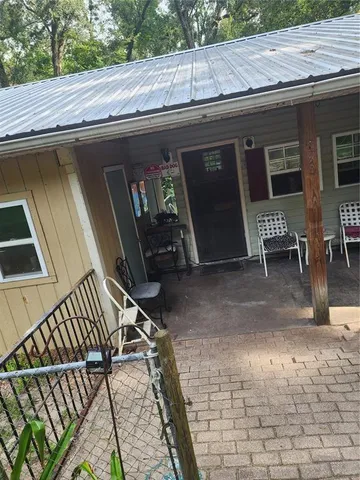 a view of outdoor space with seating area